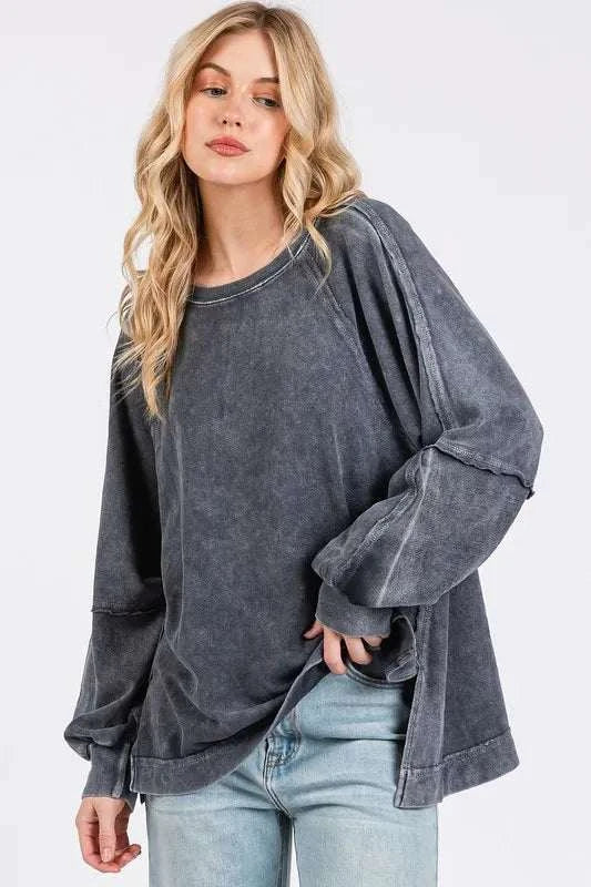 Mineral wash raglan long sleeve oversized top in soft cotton with exposed seams and slit detail for casual comfort and style